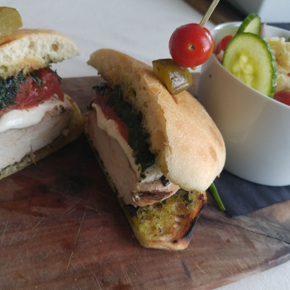 Aqua - Tuscan Chicken Sandwich served with side house salad.  House dressing was a tangy & bright vingarette. - Seafood Near Me - Tampa, Florida