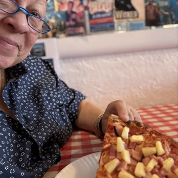 Giovanni's Pizzeria - Pizza slice with pineapple. - Pizza Near Me - Albuquerque, New Mexico