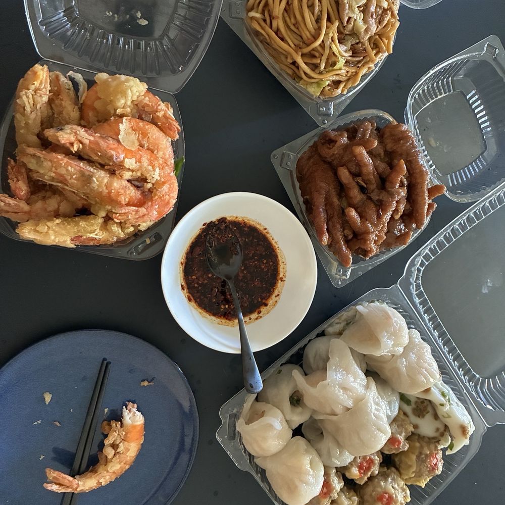 Fried Shrimp, Large Noodle Chow Mein, Chicken Feet, a mix of other items Fried Shrimp, Large Noodle Chow Mein, Chicken Feet, a mix of other items