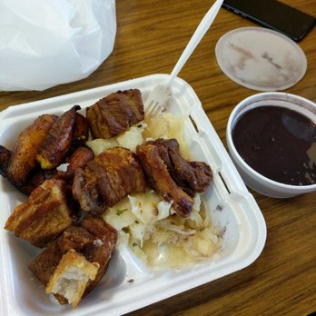Liborios Latin Cafe - Fried pork chunks, boiled yucca, plaintains and black beans - Cuban Near Me - Tampa, Florida Liborios Latin Cafe - Fried pork chunks, boiled yucca, plaintains and black beans - Cuban Near Me - Tampa, Florida