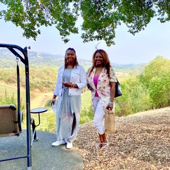 Icaria Winery - Enjoying our time at Icaria on their beautiful back patio - Wine Tasting Room Near Me - Cloverdale, California