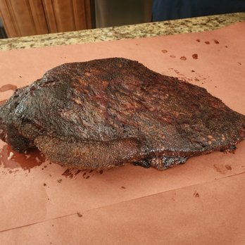Dave's Meat Service - After 15 hours of slow smoking! Time to wrap in butcher paper - Meat Shops Near Me - Modesto, California Dave's Meat Service - After 15 hours of slow smoking! Time to wrap in butcher paper - Meat Shops Near Me - Modesto, California