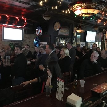 Jet's Public House - a large group of people sitting at a bar - Sports Bars Near Me - Chicago, Illinois