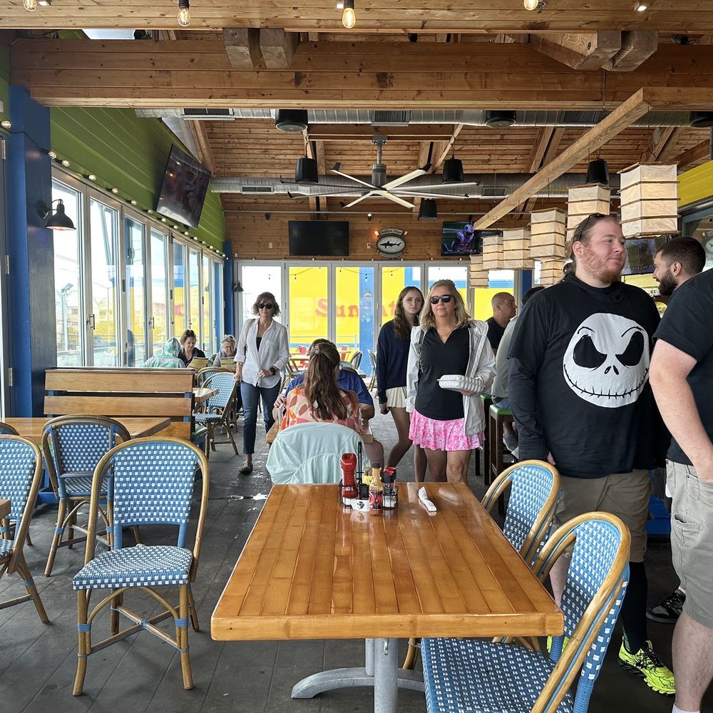 Bad Monkey - a group of people in a restaurant - Burgers Near Me - Ocean City, Maryland