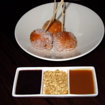 Star Noodle - Malasadas (donuts), which came with three sauces for dipping: caramel, chocolate, butterscotch, and chopped peanuts - Asian Fusion Near Me - Lahaina, Hawaii Star Noodle - Malasadas (donuts), which came with three sauces for dipping: caramel, chocolate, butterscotch, and chopped peanuts - Asian Fusion Near Me - Lahaina, Hawaii