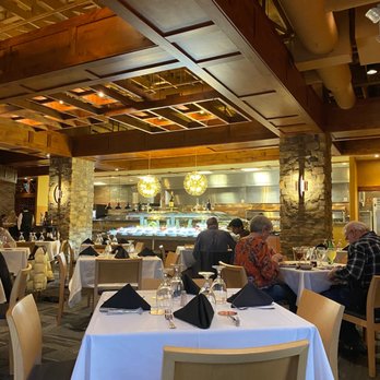 Fogao Gaucho - Salad bar area and dining table - Brazilian Near Me - Bloomington, Minnesota