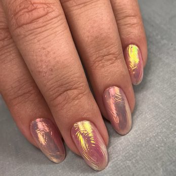 Rikita Nails - Iridescent chrome nail art over a soft pink base, creating a luminous, color-shifting finish with a unique textured effect. - Nail Technicians Near Me - Agoura Hills, California Rikita Nails - Iridescent chrome nail art over a soft pink base, creating a luminous, color-shifting finish with a unique textured effect. - Nail Technicians Near Me - Agoura Hills, California