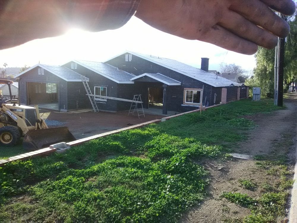 Slide of Outlaw Roofing