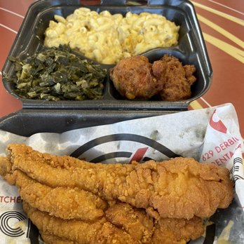 Chicken’s Kitchen - @justtwobitez on IG  Catfish, 5 star mac, coco greens and crawfish hush puppies $13. - Soul Food Near Me - Harvey, Louisiana