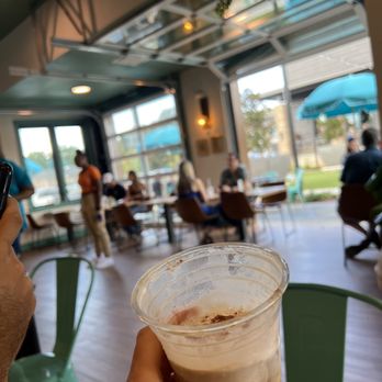 Summit Coffee - Almond milk latte with whipped cream and cinnamon - Coffee & Tea Near Me - Huntersville, North Carolina Summit Coffee - Almond milk latte with whipped cream and cinnamon - Coffee & Tea Near Me - Huntersville, North Carolina