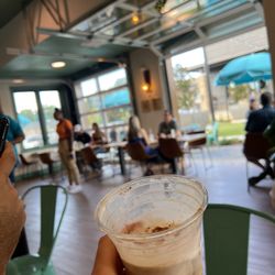 Summit Coffee - Almond milk latte with whipped cream and cinnamon