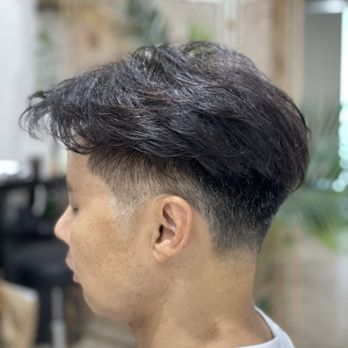 Eddie's Edition - San Gabriel - Medium taper on the sides with finishing wax to style the hair. Sean did an excellent job! - Hair Salons Near Me - San Gabriel, California