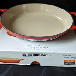 Le Creuset Outlet Store - Cerise 1-qt oval cast iron baker for $131 less 40% off for a total of $78.60.