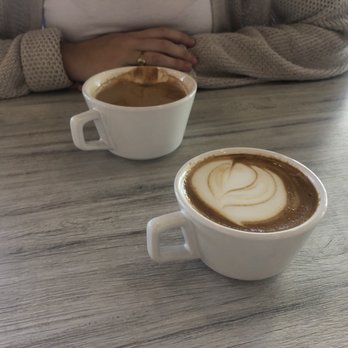 Sago Coffee - My latte (and my friends who had already started drinking hers haha) - Coffee & Tea Near Me - Jacksonville Beach, Florida Sago Coffee - My latte (and my friends who had already started drinking hers haha) - Coffee & Tea Near Me - Jacksonville Beach, Florida