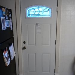 Buddy's Home Repair Remodeling - New door frame and entry door.
Preexisting window has been removed.
(This is the inside view)
