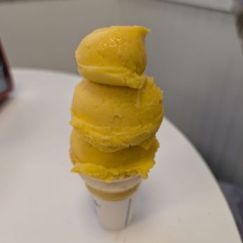 Handel's Homemade Ice Cream - Mango sorbet cake cone - Ice Cream & Frozen Yogurt Near Me - Austin, Texas Handel's Homemade Ice Cream - Mango sorbet cake cone - Ice Cream & Frozen Yogurt Near Me - Austin, Texas