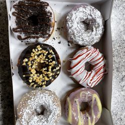 Duck Donuts - Cookies & Cream, Blueberry Pancake, Chocolate Caramel Crunch, Strawberry Confetti, French Toast, and Blueberry Lemonade