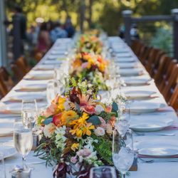 Granara's Flowers - Wedding reception - Centerpiece flowers flowing down the table
