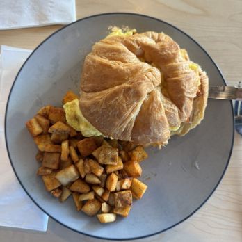 Whisk & Grind - Ham croissant sandwich with potatoes - Breakfast & Brunch Near Me - Cocoa Beach, Florida