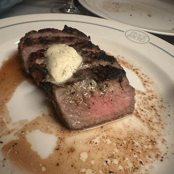 Stock & Bond - New York strip(14oz) 2 pieces were missing in this photo. We got the black truffle butter as well. Not worth it. This was "medium" cook - Steakhouses Near Me - Minneapolis, Minnesota Stock & Bond - New York strip(14oz) 2 pieces were missing in this photo. We got the black truffle butter as well. Not worth it. This was "medium" cook - Steakhouses Near Me - Minneapolis, Minnesota