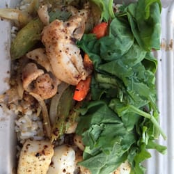 Iron Grill Hawaii - Combo of calamari steak and lemon glass chicken comes with organic salad and a choice of white or brown rice $12.50 SUPER ONO!!