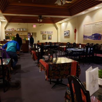 Little Yunnan Restaurant - the dining area with tables and chairs - Asian Fusion Near Me - Victoria, British Columbia Little Yunnan Restaurant - the dining area with tables and chairs - Asian Fusion Near Me - Victoria, British Columbia