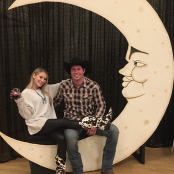 A. S. Danielson's - KCFB Annual Beer v Wine a sweet couple having their picture taken with the "Man in the Moon" - Party & Event Planning Near Me - Armona, California A. S. Danielson's - KCFB Annual Beer v Wine a sweet couple having their picture taken with the "Man in the Moon" - Party & Event Planning Near Me - Armona, California