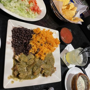 Monarquia Authentic Mexican Restaurant - Carnitas verde with side of lettuce and tomato with bowl of espinaca - Mexican Near Me - Amherst, New Hampshire Monarquia Authentic Mexican Restaurant - Carnitas verde with side of lettuce and tomato with bowl of espinaca - Mexican Near Me - Amherst, New Hampshire