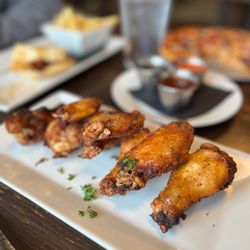 Great American Events - Chicken wings with three sauces: fire, bbq and sweet chili.