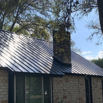 Roofing Contractor Solutions - 24 gauge standing seam black metal. - Roofing Near Me