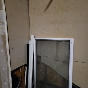 Advantage Property Management - Windows and damage drywall from previous tenants left in garage - Property Management Near Me - Fort Collins, Colorado Advantage Property Management - Windows and damage drywall from previous tenants left in garage - Property Management Near Me - Fort Collins, Colorado