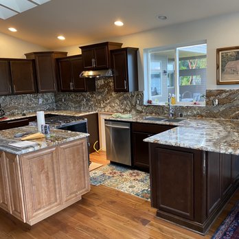 Natural Stoneworks - This is a kitchen with full high backsplash With the OG edge detail Material 3cm Amarone - Kitchen & Bath Near Me - Olympia, Washington Natural Stoneworks - This is a kitchen with full high backsplash With the OG edge detail Material 3cm Amarone - Kitchen & Bath Near Me - Olympia, Washington