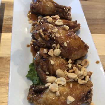 The Chicken Coop Kitchen & Bar - Thai peanut chicken wings - Pubs Near Me - Johnston, Rhode Island