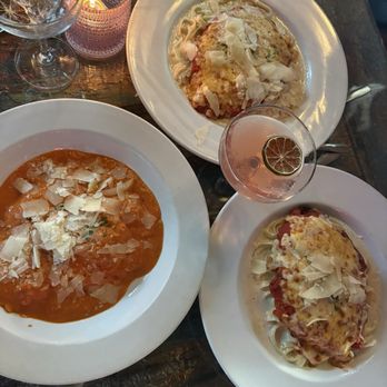 Bella Bella - Yummy Cosmo..delicious chicken parm with fettuccine alfredo.. the special of the night braised short rib ravioli in  a alla vodka sauce. - Italian Near Me - Tallahassee, Florida