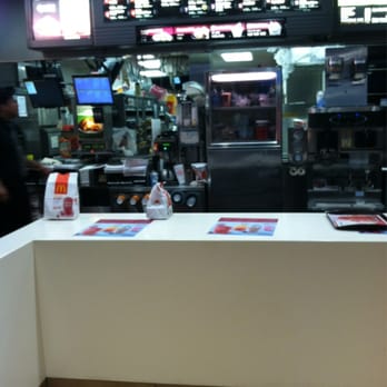 McDonald's - a counter with a menu in the background - Fast Food Near Me - Channelview, Texas