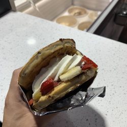 The Custard Hut - Waffle sandwich with strawberry, banana, and nutella.