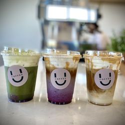 Coffee U - Left to right: Matcha Einspanner with blueberry and foam, Blueberry Latte with foam, Einspanner with hazelnut