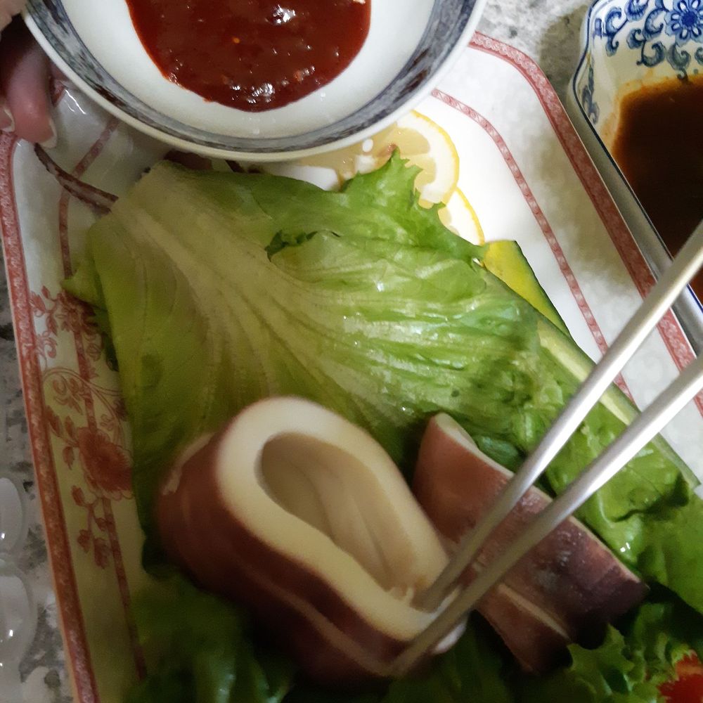 H Mart - What's left of the steamed squid after we devoured it-with thick, rich gochujang. Delicious. - International Grocery Near Me - Thornhill, Ontario