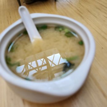 Shoyu - a bowl of soup with a spoon in it - Japanese Near Me - Saint Paul, Minnesota Shoyu - a bowl of soup with a spoon in it - Japanese Near Me - Saint Paul, Minnesota