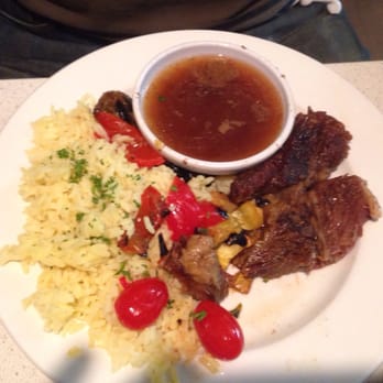 Cedars Mediterranean Kitchen - Pomegranate beef ribs with rice. Lunch portion . Yummy! - Middle Eastern Near Me - Chicago, Illinois Cedars Mediterranean Kitchen - Pomegranate beef ribs with rice. Lunch portion . Yummy! - Middle Eastern Near Me - Chicago, Illinois