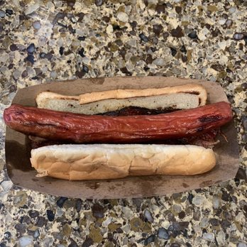 Orchards Bbq and Grill - Bacon wrapped hotdog; onions and bacon are underneath the over cooked hotdog. - Barbeque Near Me - Whittier, California Orchards Bbq and Grill - Bacon wrapped hotdog; onions and bacon are underneath the over cooked hotdog. - Barbeque Near Me - Whittier, California