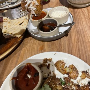 Cardamom - Fried potatoes. So good and crispy in right edges za'atar, feta, garam masala ketchup - Mediterranean Near Me - Minneapolis, Minnesota