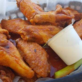 Rick's On the River - Naked hot wings. Must have at least an order of 20 for them to split wing sauces. - New American Near Me - Tampa, Florida Rick's On the River - Naked hot wings. Must have at least an order of 20 for them to split wing sauces. - New American Near Me - Tampa, Florida