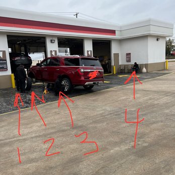 Jiffy Lube - 4 guys changing a tire. 45 minutes later. Ugh. You ain't got nuttin' better to do but I sure do. - Oil Change Stations Near Me - Hurst, Texas