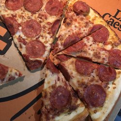 Little Caesars Pizza - It's not rocket science how to cut a pizza....it was a big laugh with my guest I had over....gesh