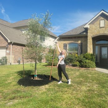 Moon Valley Nurseries - Happy customer with new tree - Landscaping Near Me - Spring, Texas