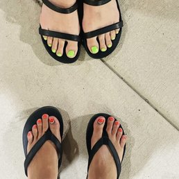 My watermelon toes, and my friends bright green toes, by Kayla.