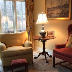 MacKinnon Interiors - A comfy room near the Falls River.