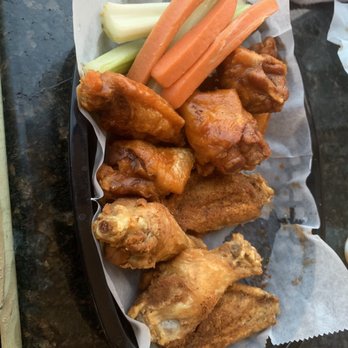 Rick's On the River - Blackened dry rub wings and medium wings - New American Near Me - Tampa, Florida Rick's On the River - Blackened dry rub wings and medium wings - New American Near Me - Tampa, Florida