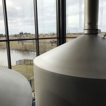Wisconsin Brewing Company - View past beer tubs to the cold outdoors - Music Venues Near Me - Verona, Wisconsin Wisconsin Brewing Company - View past beer tubs to the cold outdoors - Music Venues Near Me - Verona, Wisconsin